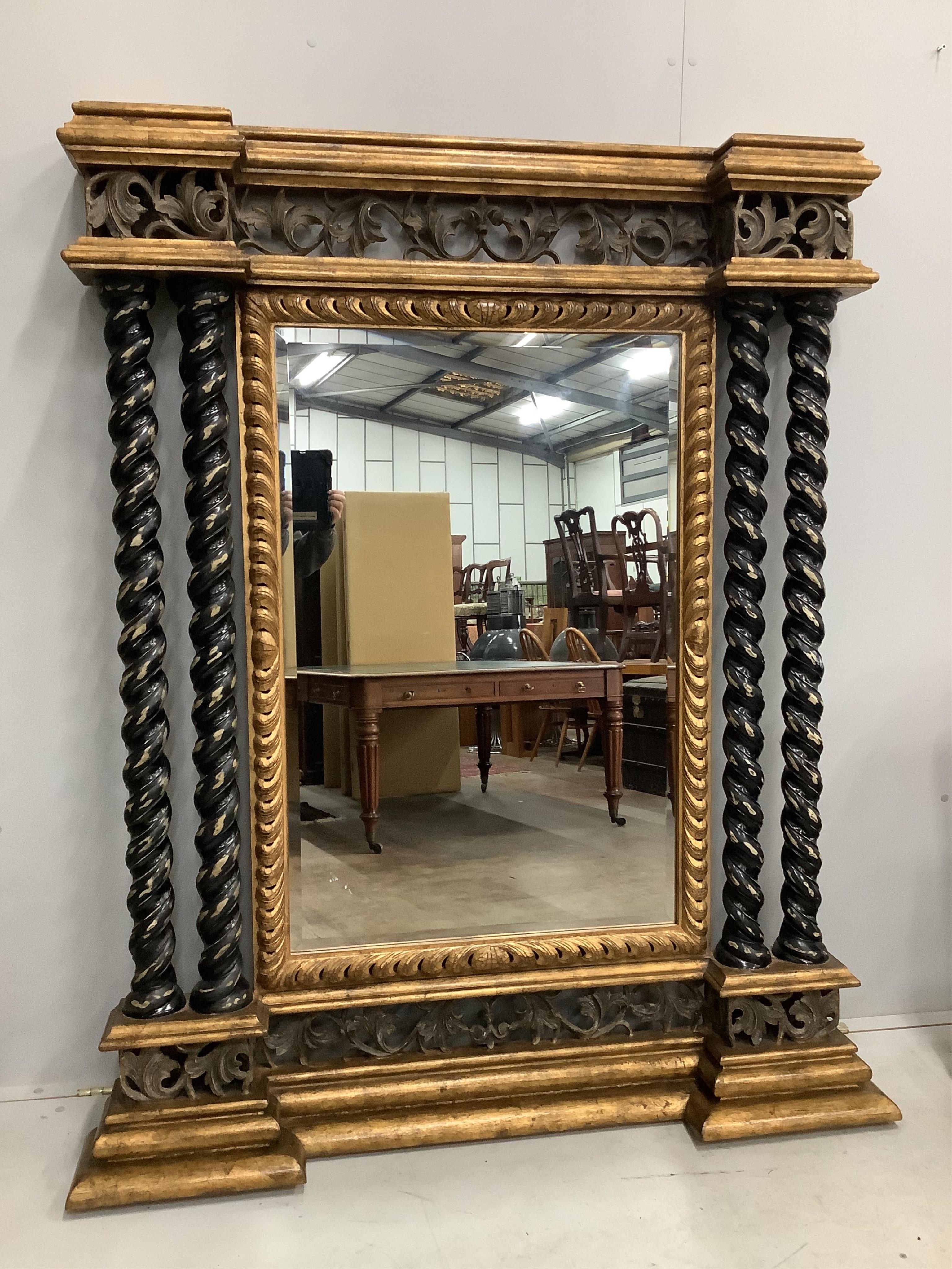 A Harrison Gil parcel gilt console table with marble inset top, width 180cm, depth 51cm, height 85cm and matching ornate wall mirror, width 138cm, height 165cm. Condition - fair to good, some minor chipping